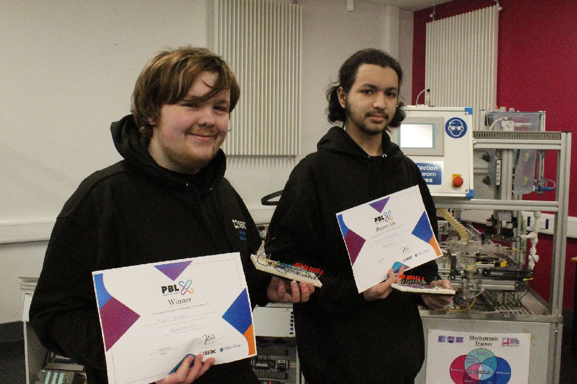 Picture of electrical students with their certificates